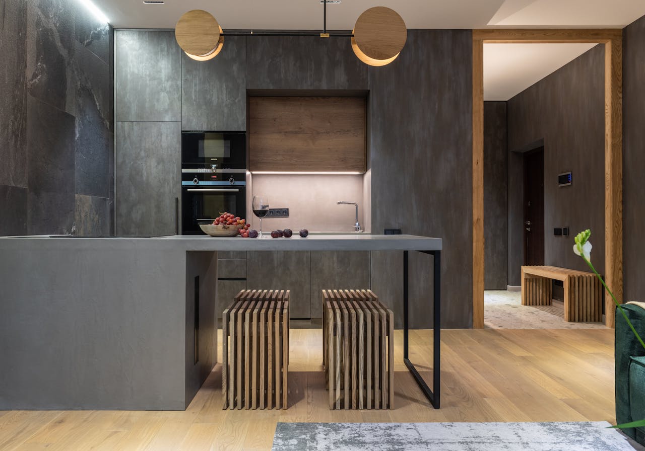 Sleek modern kitchen with a minimalist style and elegant lighting.